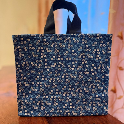 Blue tote gift bag with floral pattern 
