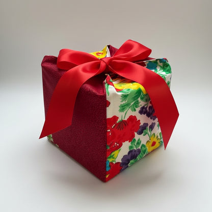 Red & white floral fabric gift box with a red ribbon closure