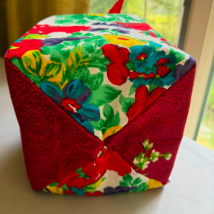 Red & white floral fabric gift box with a red ribbon closure in 7X7X7 square size.