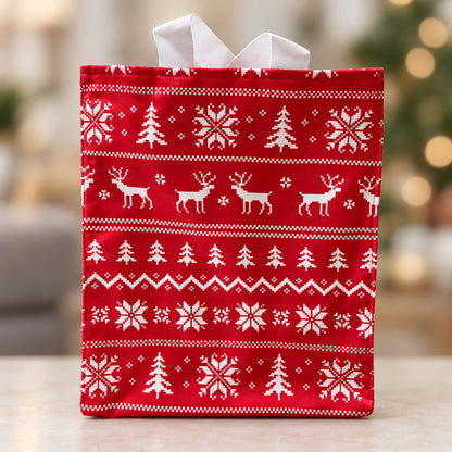 Fabric Gift Bag Medium in a red holiday Nordic print with pine trees, snowflakes, and reindeers.