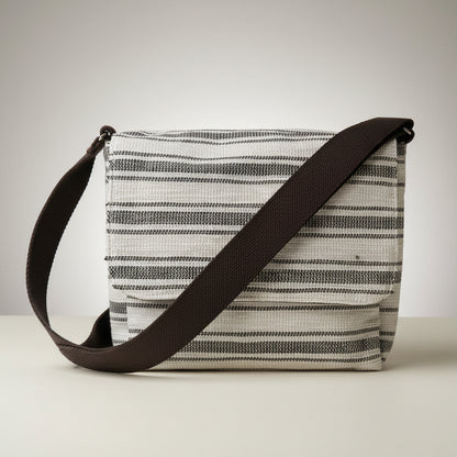 Upcycled handwoven Messenger Bag in a dark brown and white striped weave and a dark brown strap.