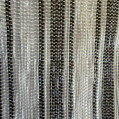 Close-up of upcycled handwoven Messenger Bag in a dark brown and white striped weave and a dark brown strap.