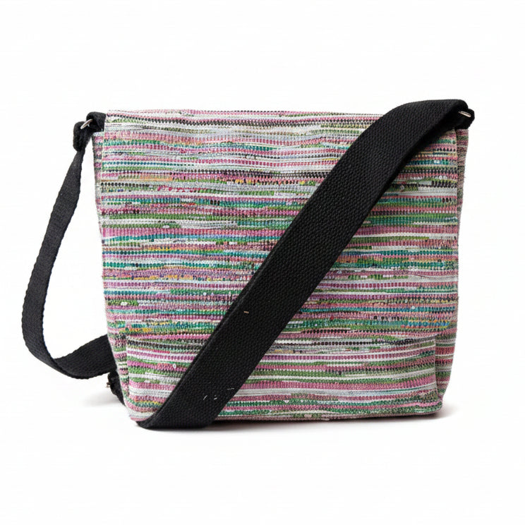 Upcycled handwoven Messenger Bag in multicolored weave with a black strap.