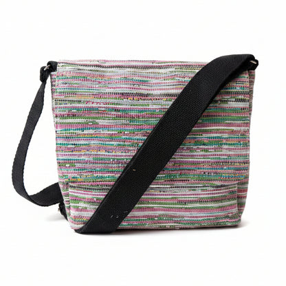 Upcycled handwoven Messenger Bag in multicolored weave with a black strap.