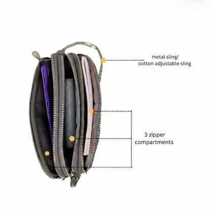Top view of the Taco sling bag highlighting the metal sling and cotton adjustable strap, and three zipper compartments.