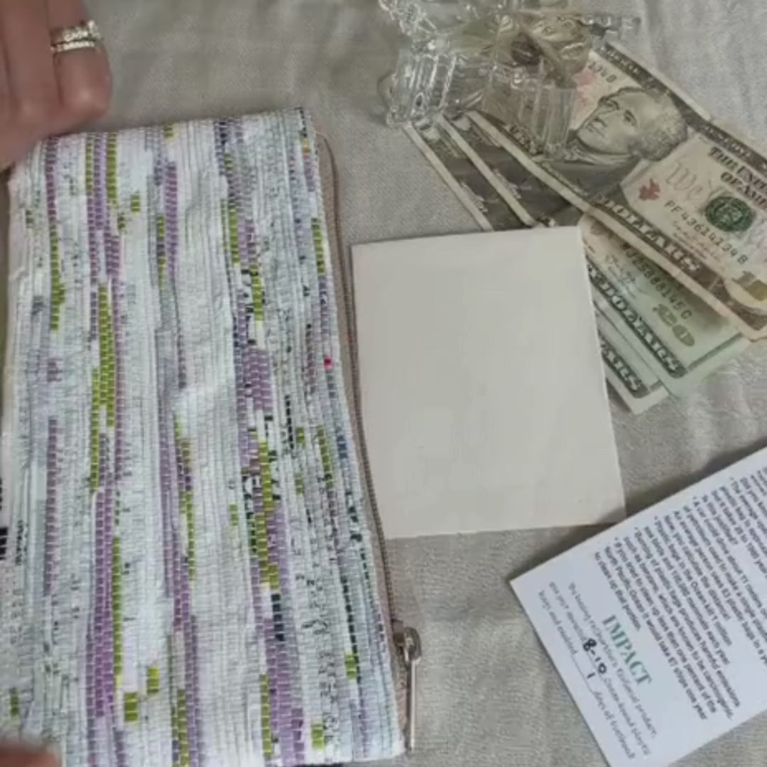 Video of an Upcycled Handcrafted Compact Pouch used as a Cash Gift Holder.