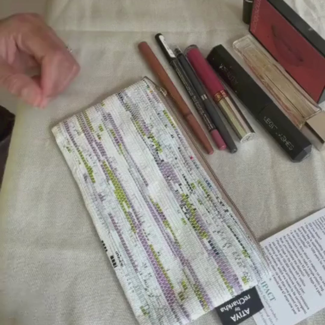 Video of an Upcycled Handcrafted Compact Pouch used as a Makeup Organizer.